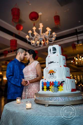 Bride and groom - bride and groom at sangeet - bride and groom at tea ceremony - personalized wedding cake