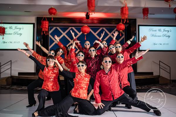 Sangeet - Chinese lanterns - multicultural wedding celebration - groom's family dancing