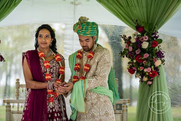 Indian wedding ceremony - multicultural wedding - Hindu wedding ceremony - bride and groom on mandap