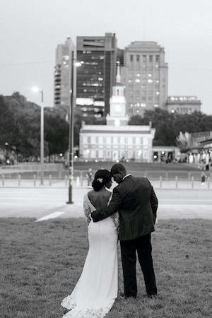 black and white photo os a bride and groom in front of Independence Hall in Old City Philadelphia