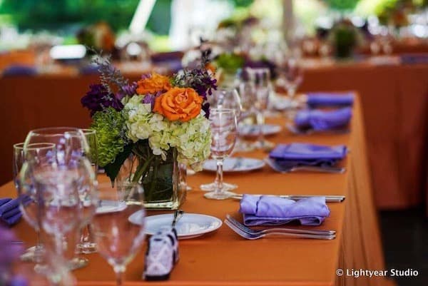 colorful orange and purple decor at a Philadelphia South Asian wedding reception