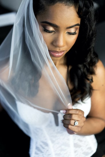 Philadelphia bride posing for photos before her intimate wedding