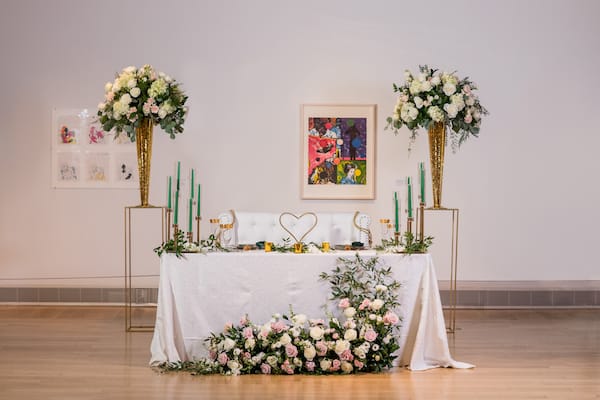 Hunter green and gold sweetheart table at PAFA