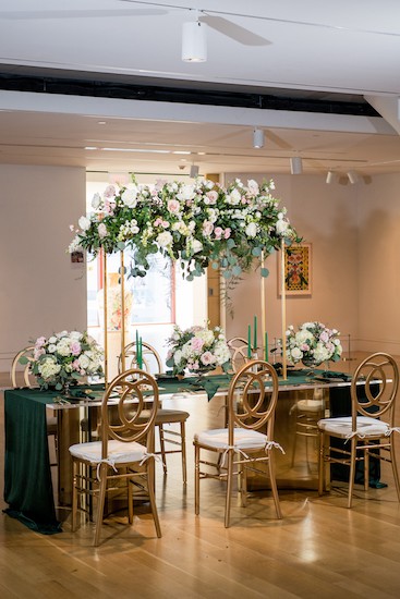 Glam hunter green and gold reception table at PAFA