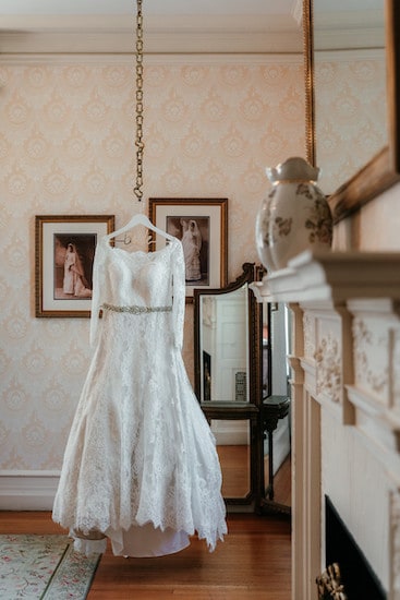 bride's wedding gown hanging in the dressing room at a Cairnwood Estate wedding