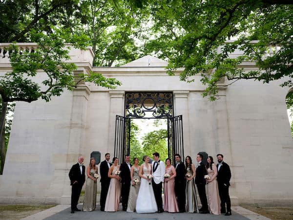 Newlywed couple with their wedding party at the Rodin Museum