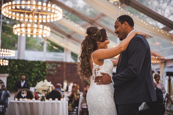 couple's first dance under a clear tent at thier Cescaphe's Franklin's View wedding