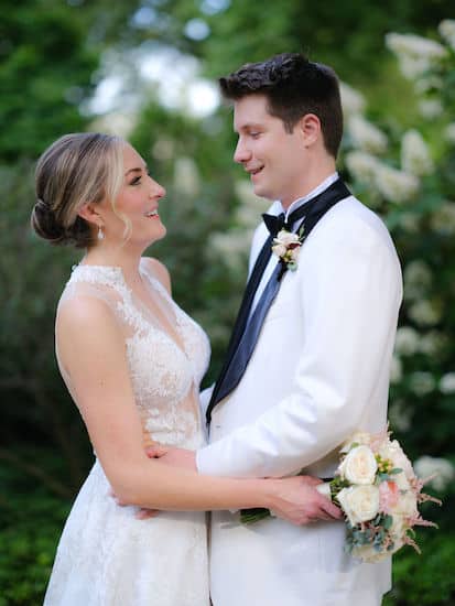 Philadelphia bride and groom embracing after their wedding ceremony