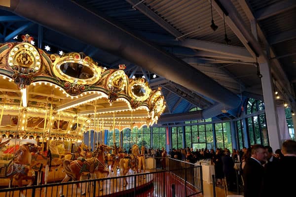 Cocktail reception in front of the carousel at a Please Touch Museum wedding