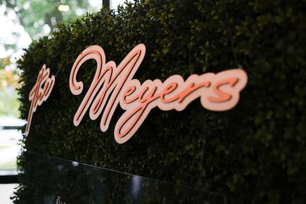 custom hedge wall with the bride and groom last name at their Please Touch Museum wedding