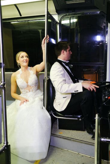 bride and groom on a SEPTA bus in an exhibit during their Please Touch Museum wedding