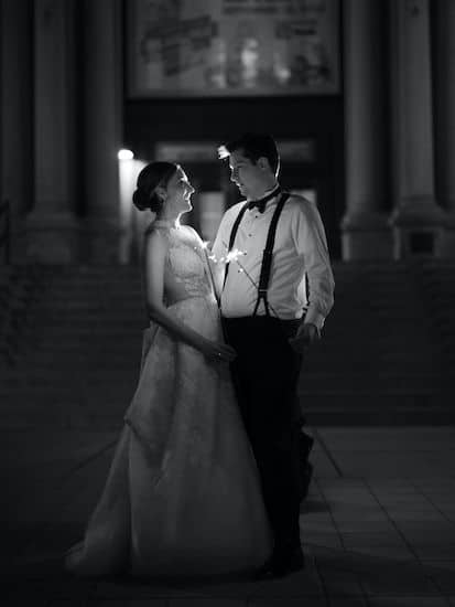 bride and groom with sparklers outside Philadelphia's Please Touch Museum