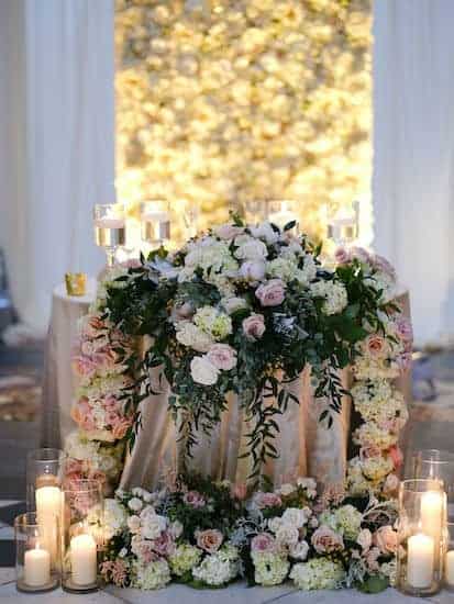 luxurious gold and blush sweetheart table in Hamilton Hall at a Please Touch Museum wedding