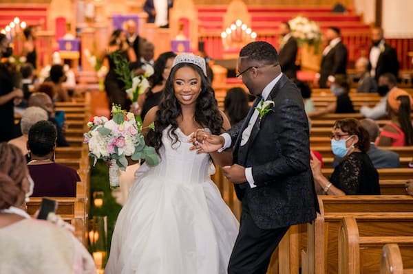 excited bride and groom after their wedding