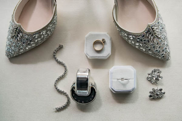 Flatly photo of a brides classic timeless accessories