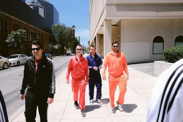 Groom and groomsmen walking through Center City Philadelphia