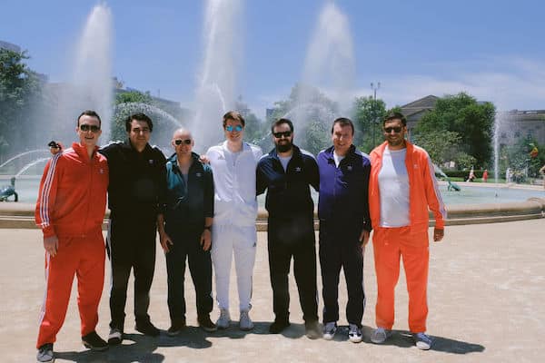 Groom and groomsmen in front of the fountain at Philadelphia's Logan Square