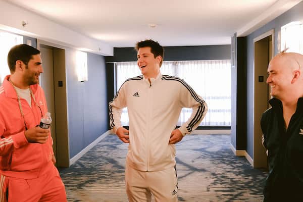 Philadelphia groom wearing a white track suit