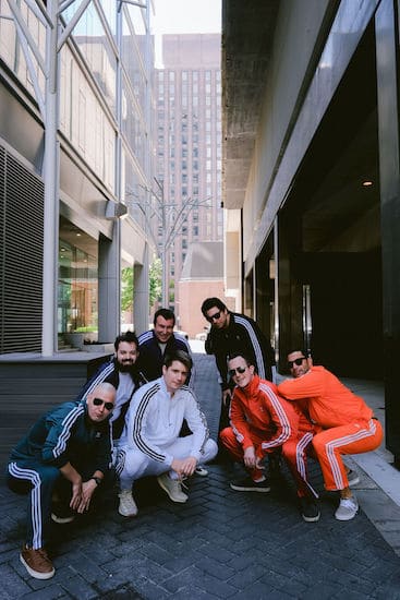 Philadelphia groom and groomsmen during a fun photoshoot