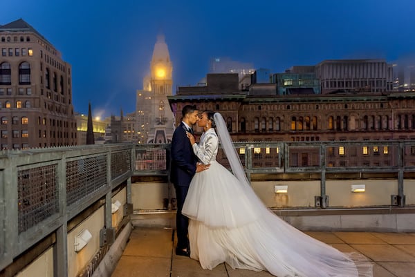 bride and groom on the rooftop of the Pennsylvania Academy of the Fine Arts