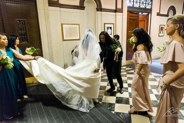 Donielle Warren, owner of Elegant Events Planning and Design in Philadelphia getting a bride ready to go down the aisle