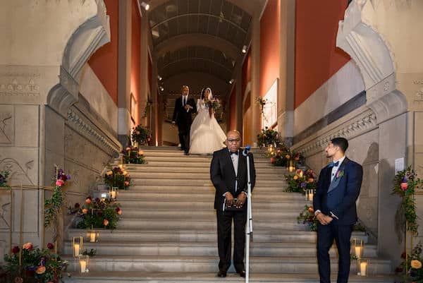 Philadelphia bride walking down the stairs of the Washington Foyer at the Pennsylvania Academy of the Fine Arts