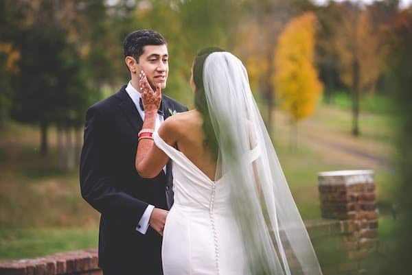 emotional groom during his first look at his bride