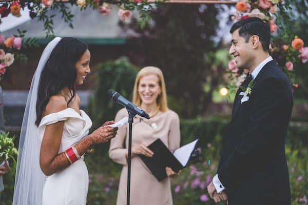 Bride and groom exchanging wedding vows