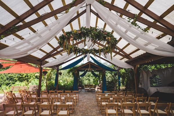 beautiful country chic outdoor wedding with a modern mandap