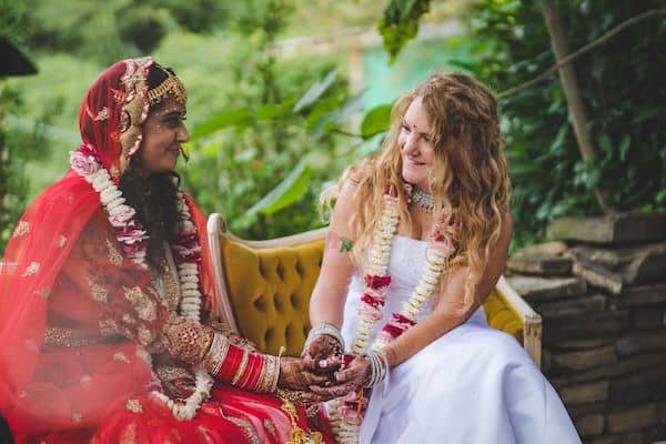 two brides during a traditional South Asian wedding