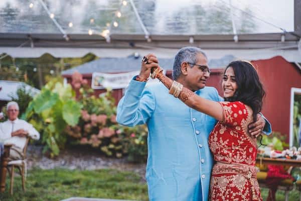 South Asian bride during her father daughter dance