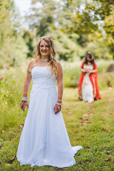 Two brides sharing their first look