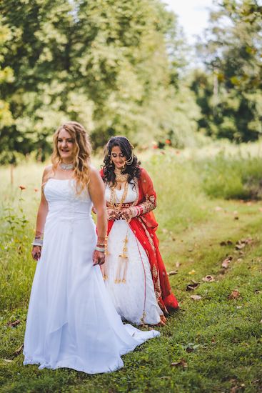 Two brides sharing their first look