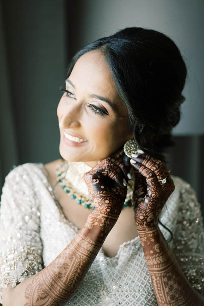 bride with henna tattoos and jewelry