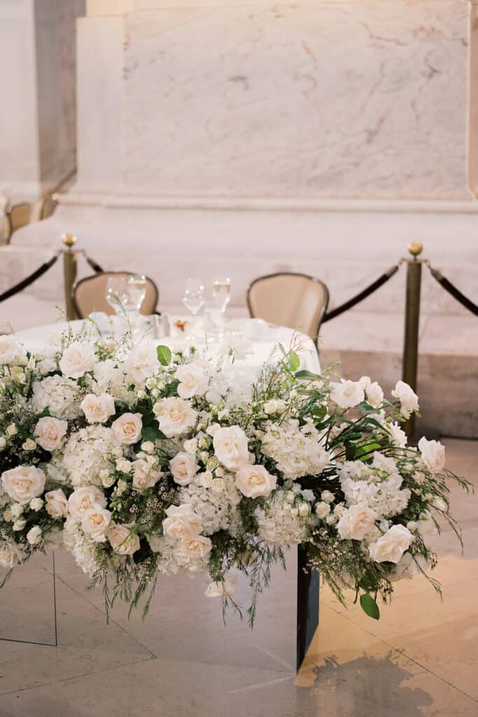 Franklin Institute Philadelphia wedding reception head table with flowers