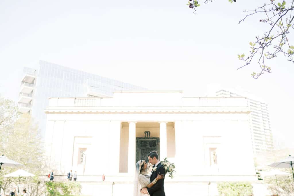 Bride and groom in front of Rodin Museum wedding venue